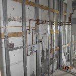 Plumbing and electrical installed for laundry room